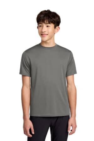 GREY CONCRETE PC380Y port & co youth performance tee